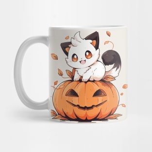 Black and white kitten sitting on a pumpkin Mug